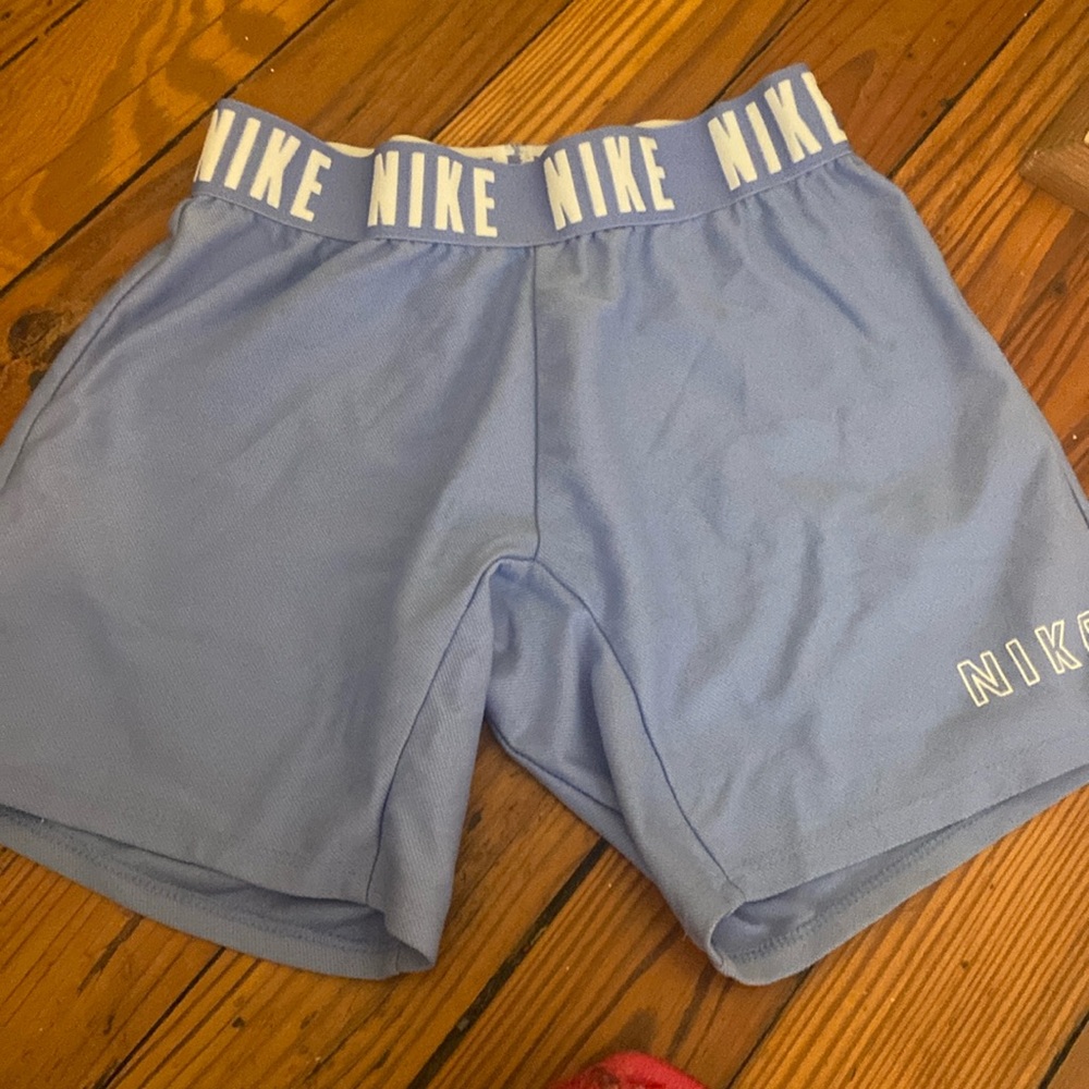 Purple/Lavender Nike pro shorts.